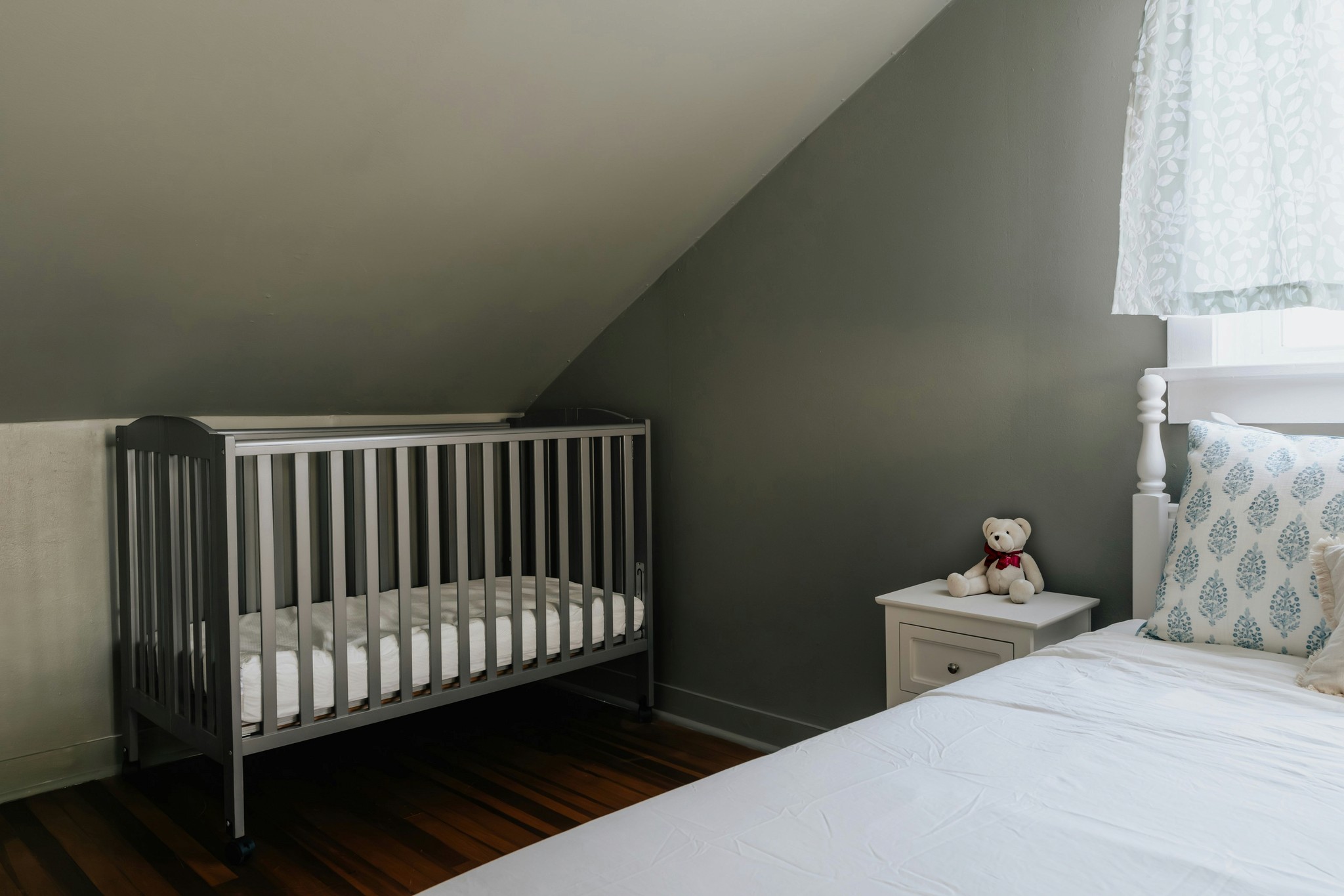 Crib set up in a family hotel room.