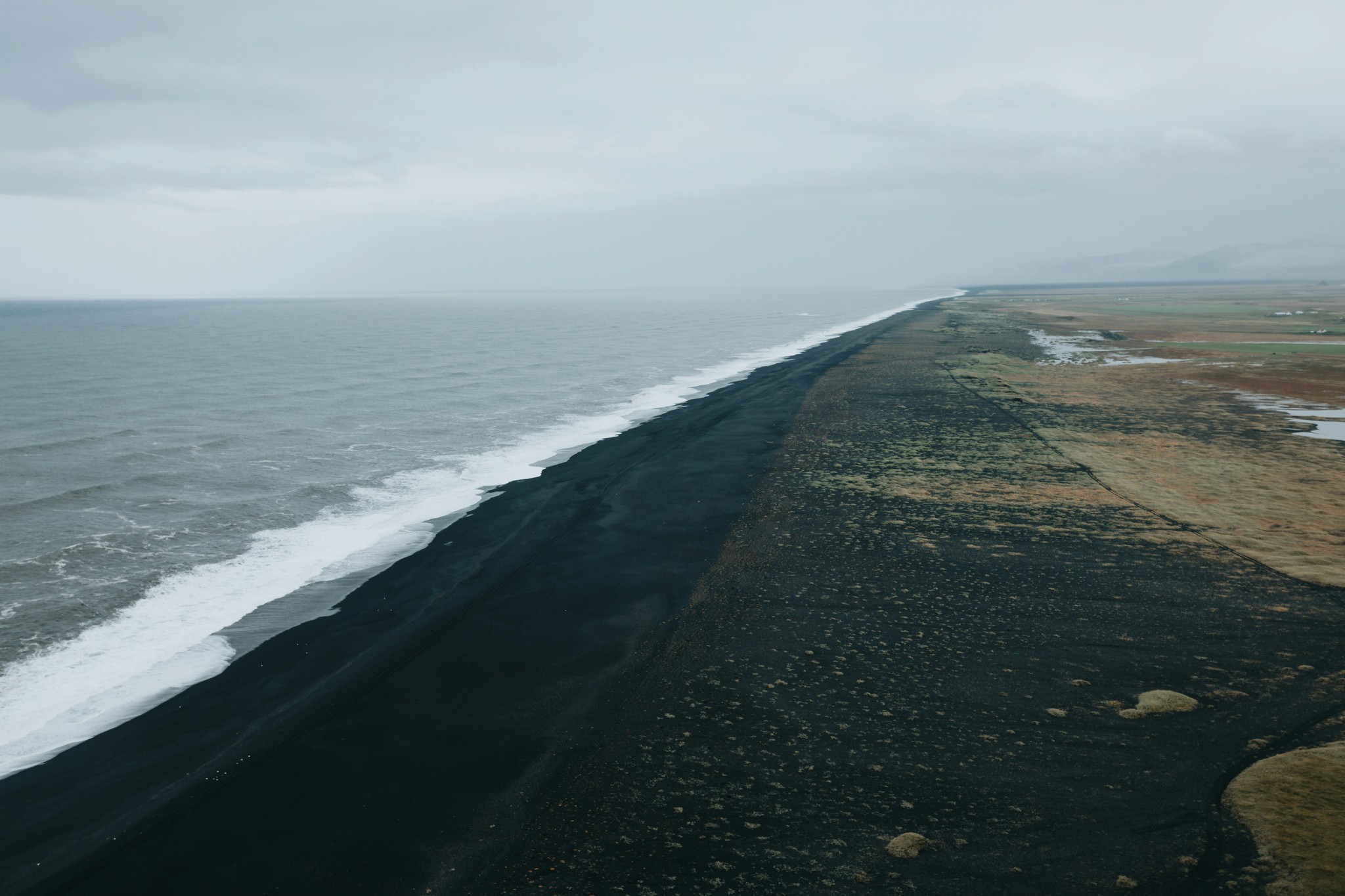A quiet black sand beach in Ölfus, South Iceland.