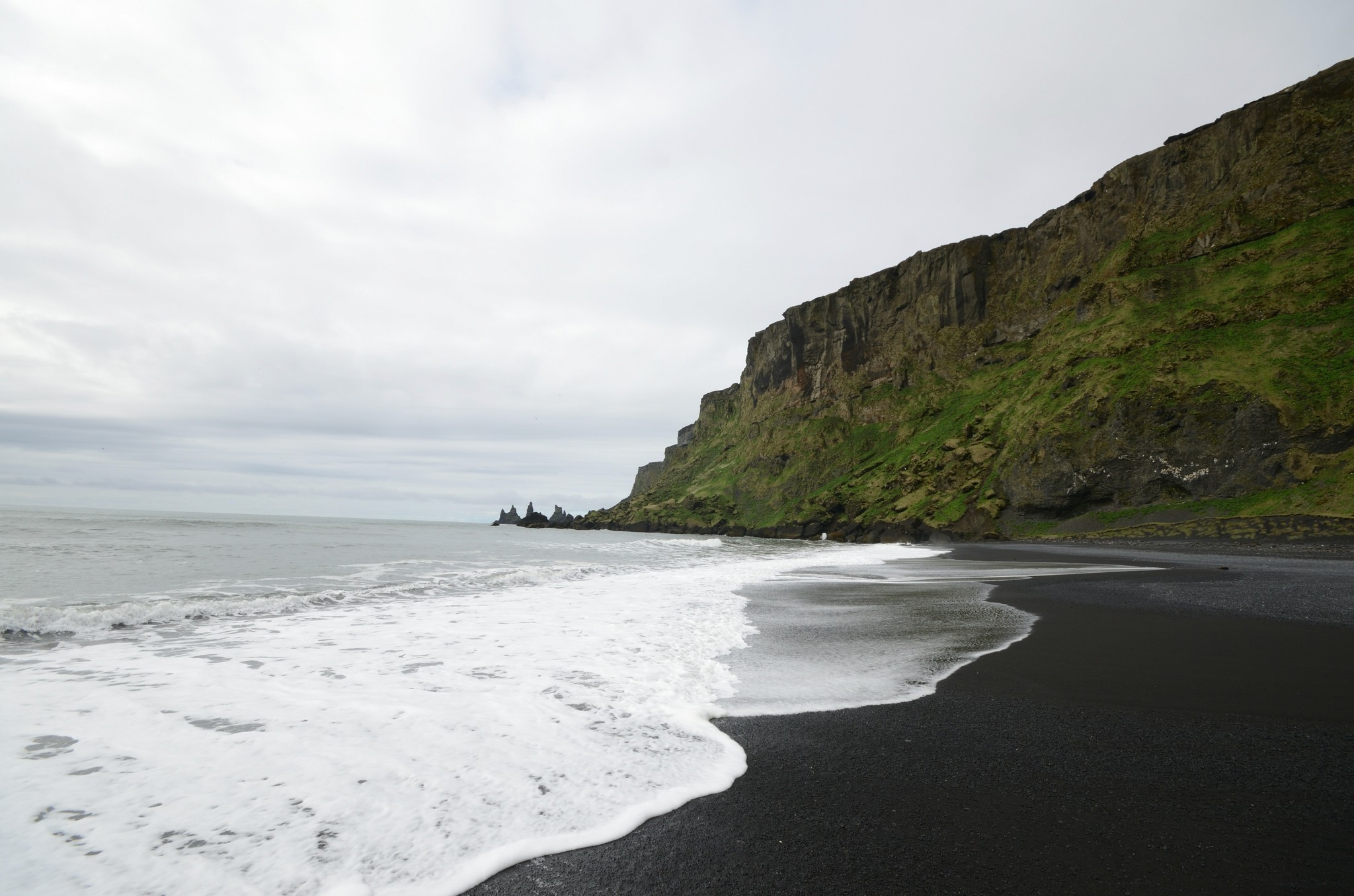 Víkurfjara black sand beach with views of the Reynisdrangar sea stacks.